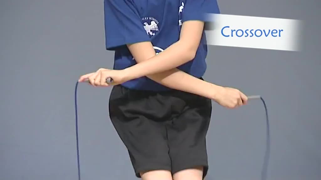 A skipper with arms crossed at the elbows, ready to jump a crossover