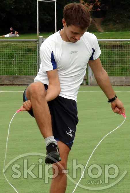 skip-hop coach demonstrating skipping outdoors